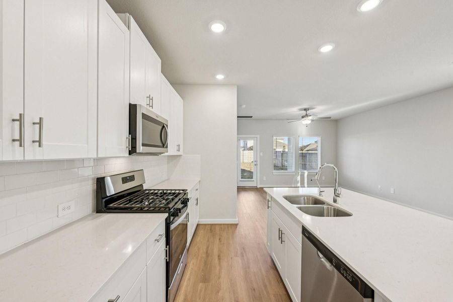 Furnished interior view inside a new home in Landing Meadows - Traditional Series, New Caney (Image 5). Furnished interior view inside a new home in Landing Meadows - Traditional Series, New Caney (Image 5).