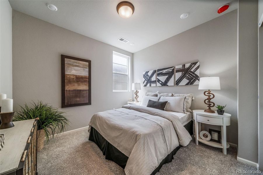 Furnished interior view inside a new home in The Reserve, Aurora (Image 19).