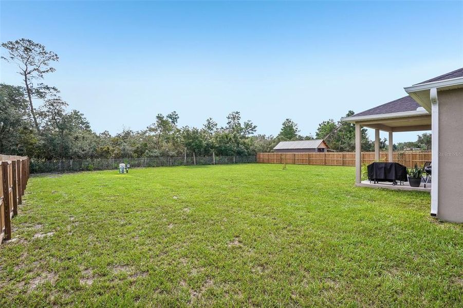 Exterior details and patio area of a home in , Umatilla (Image 27).
