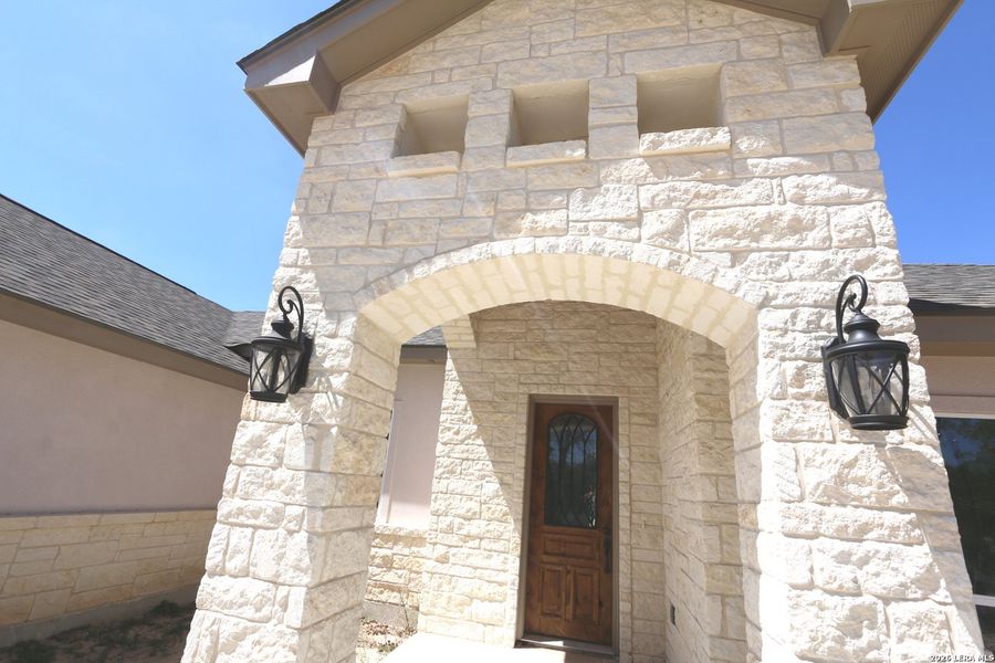 Exterior details and patio area of a home in , Floresville (Image 17).