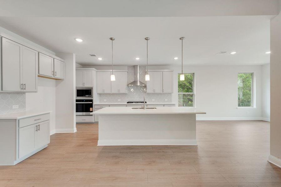 Furnished interior view inside a new home in Valencia On The Lake, Little Elm (Image 8).