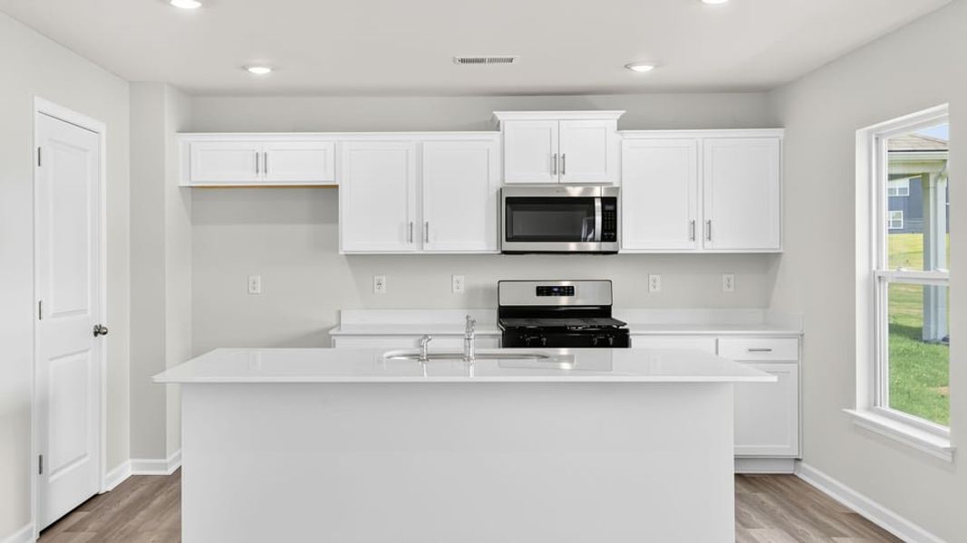 Furnished interior view inside a new home in Bentley Park, Greenwood (Image 8).