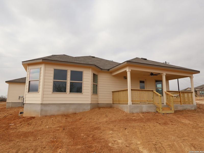 Exterior details and patio area of a home in Chaparral Ranch, Floresville (Image 4). Exterior details and patio area of a home in Chaparral Ranch, Floresville (Image 4).
