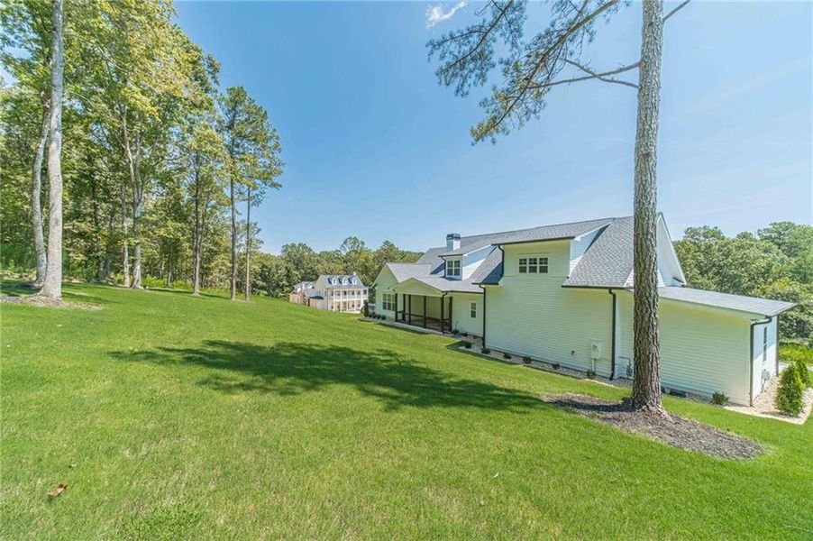 Front exterior of a new home in , Dacula, GA, highlighting curb appeal (Image 27).