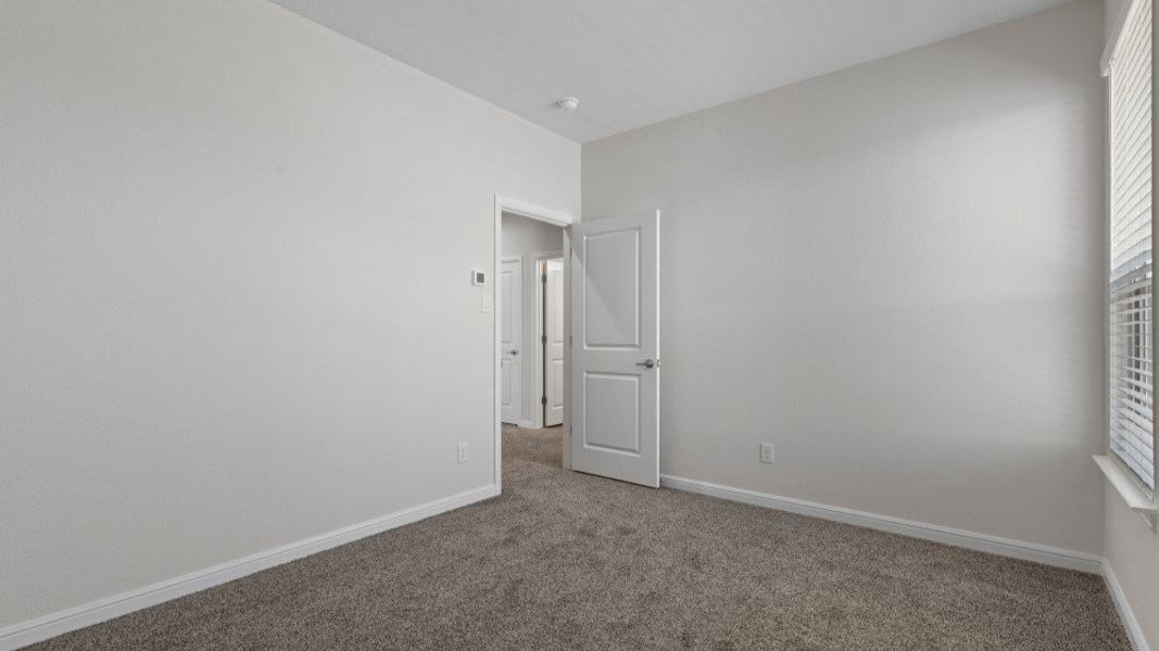 Representative unfurnished interior of a home built from the Valley Spring by D.R. Horton in Eden Ranch, Arlington (Image 42).