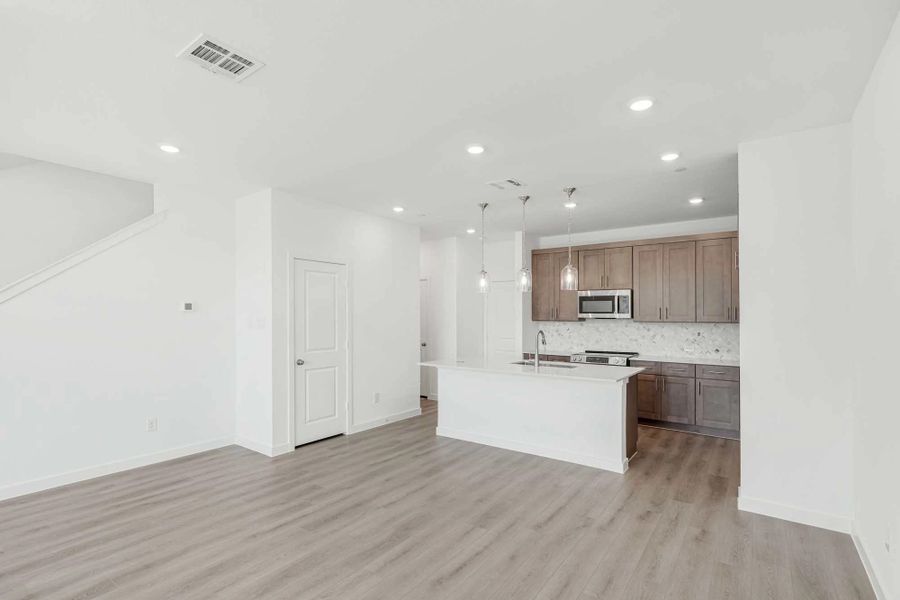 Open Kitchen-Dining Room featuring the Roosevelt Collection
