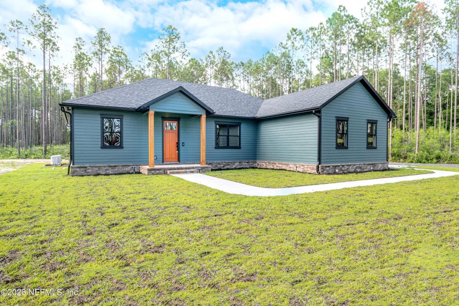 Front exterior of a new home in , Sanderson, FL, highlighting curb appeal (Image 1). Front exterior of a new home in , Sanderson, FL, highlighting curb appeal (Image 1).