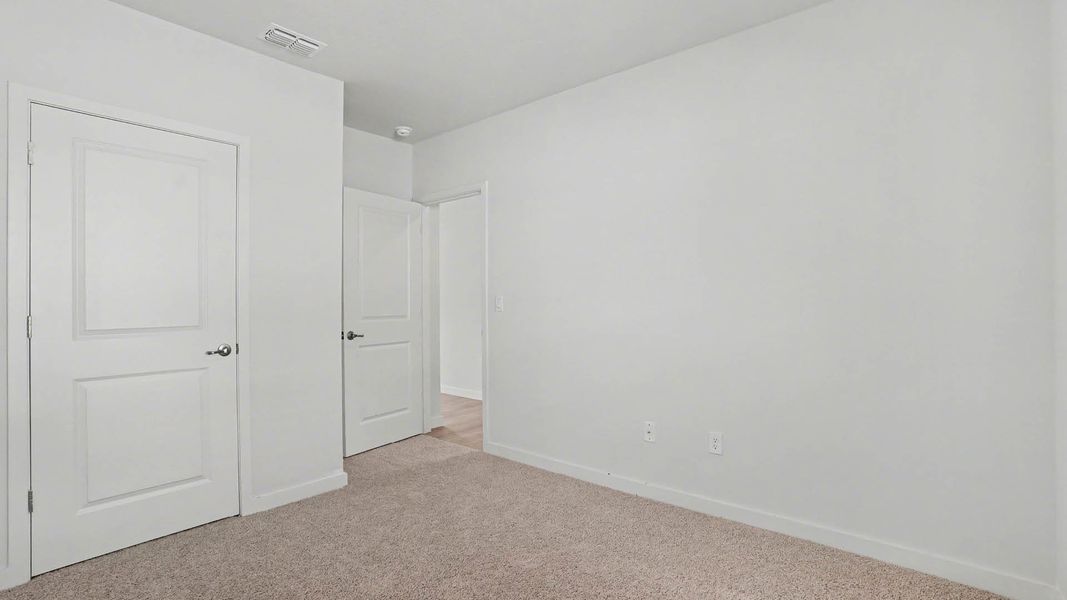 Spacious, unfurnished interior of a new home in Venetian Grove, Vero Beach (Image 15).