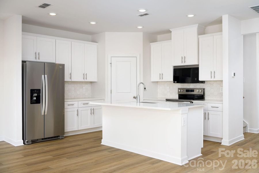 Furnished interior view inside a new home in , Mocksville (Image 28).
