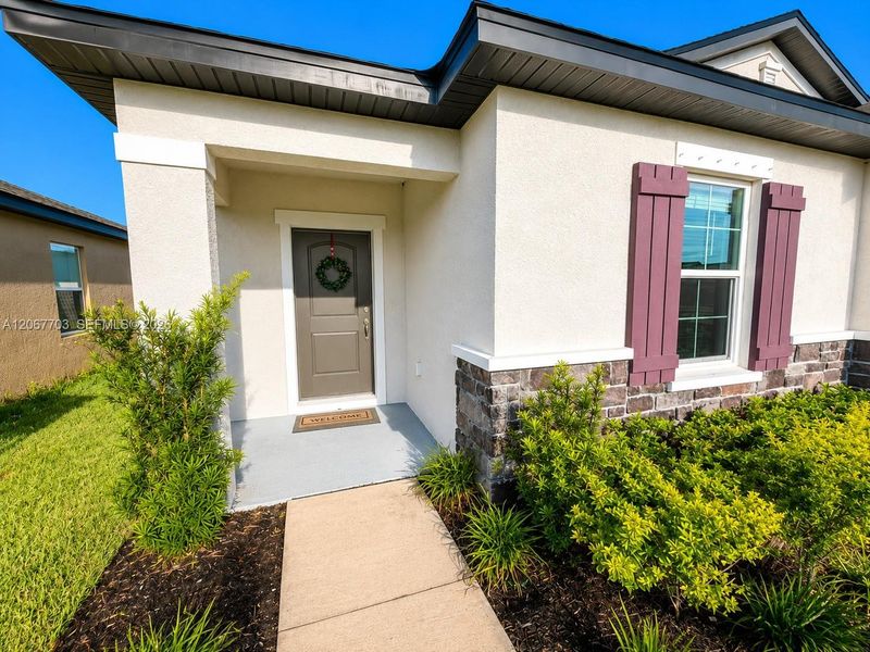 Exterior details and patio area of a home in Summerwoods, Parrish (Image 17).