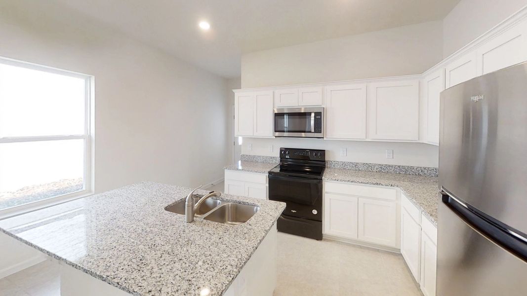 Representative furnished interior of a home built from the Enterprise by Starlight Homes in Scenic Terrace, Lake Hamilton (Image 3).