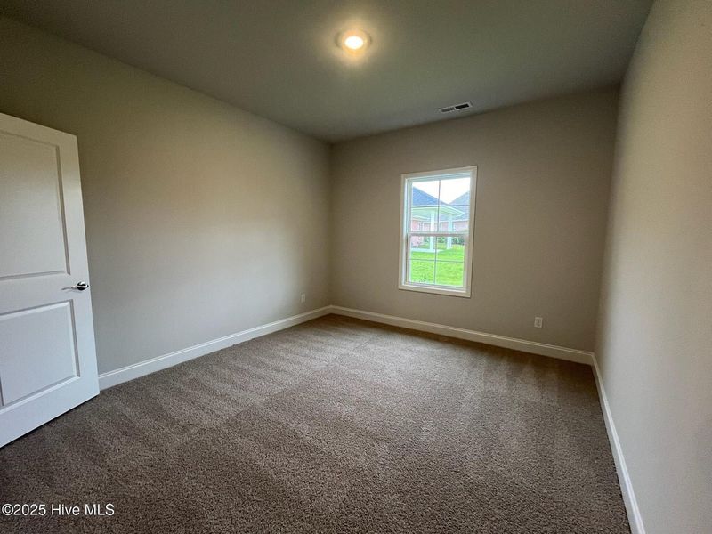 Spacious, unfurnished interior of a new home in Palmetto Creek, Bolivia (Image 22).