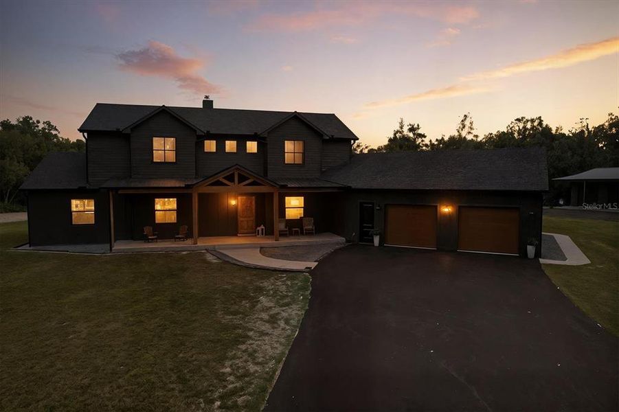 Front exterior of a new home in , Inglis, FL, highlighting curb appeal (Image 34).