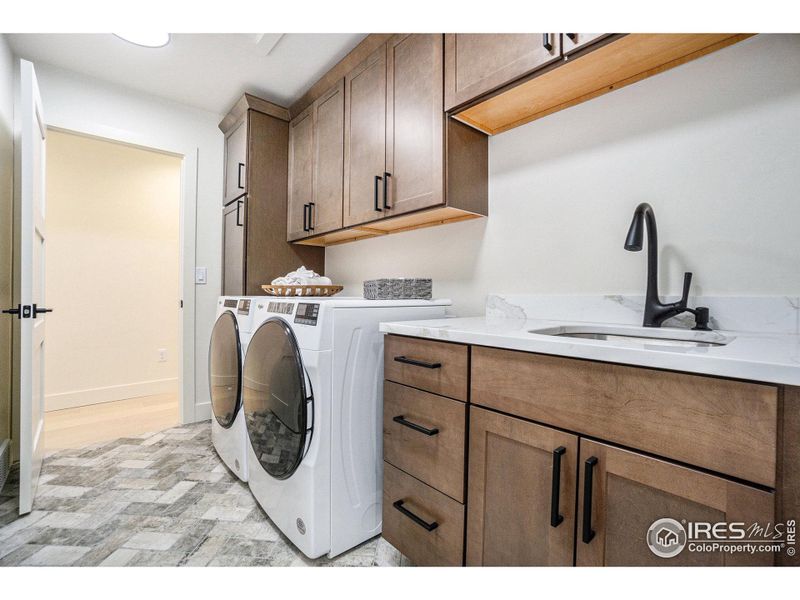 Laundry Room with Sink off Primary Bedroom