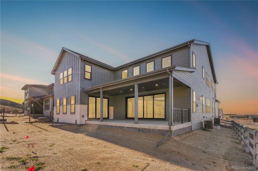 Exterior details and patio area of a home in Autograph at Lyric, Lone Tree (Image 4).