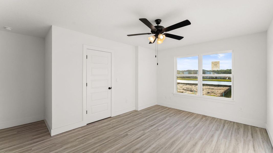 Spacious, unfurnished interior of a new home in Colonial East Townhomes, Panama City Beach (Image 23).