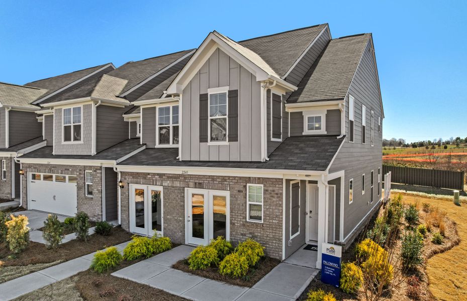Front exterior of a new home in Riverstone, Monroe, NC, highlighting curb appeal (Image 1). Front exterior of a new home in Riverstone, Monroe, NC, highlighting curb appeal (Image 1).