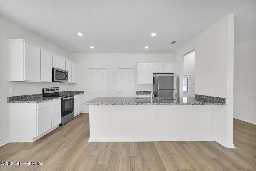 Furnished interior view inside a new home in Westport Landing, Jacksonville (Image 5).