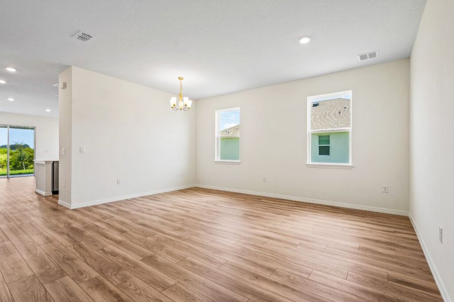 Representative unfurnished interior of a home built from the Jensen by Holiday Builders in Pineapple Grove, Port St. Lucie (Image 8).