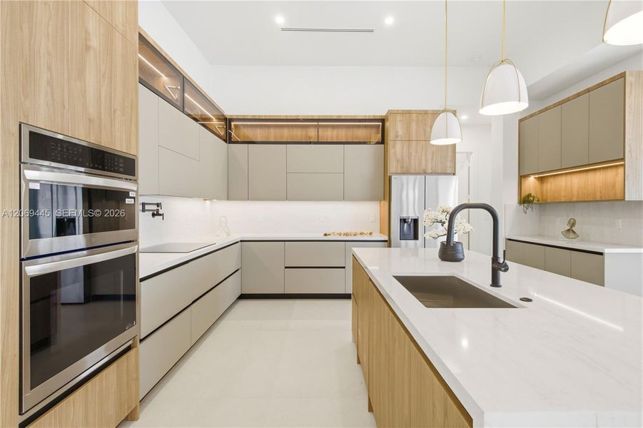 Sleek European-style cabinetry with warm wood accents and integrated LED lighting creates a sophisticated modern aesthetic. Sleek European-style cabinetry with warm wood accents and integrated LED lighting creates a sophisticated modern aesthetic.