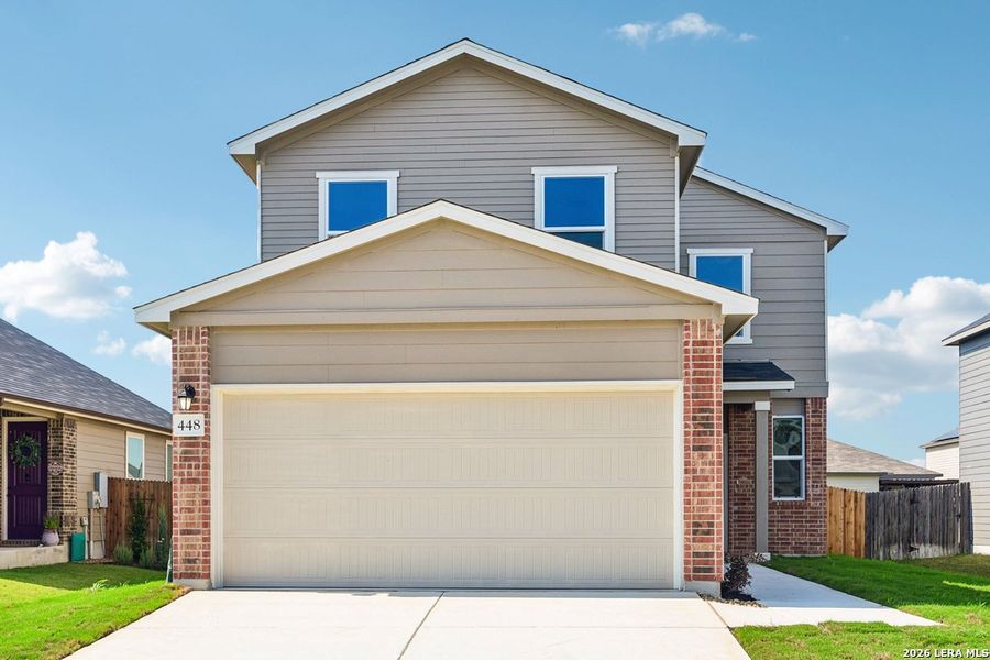 Front exterior of a new home in Woodside Farms, Seguin, TX, highlighting curb appeal (Image 22).