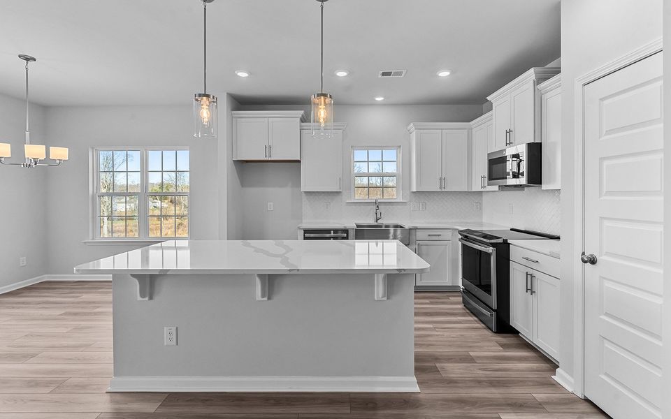 Furnished interior view inside a new home in Fieldstone, Lexington (Image 7).