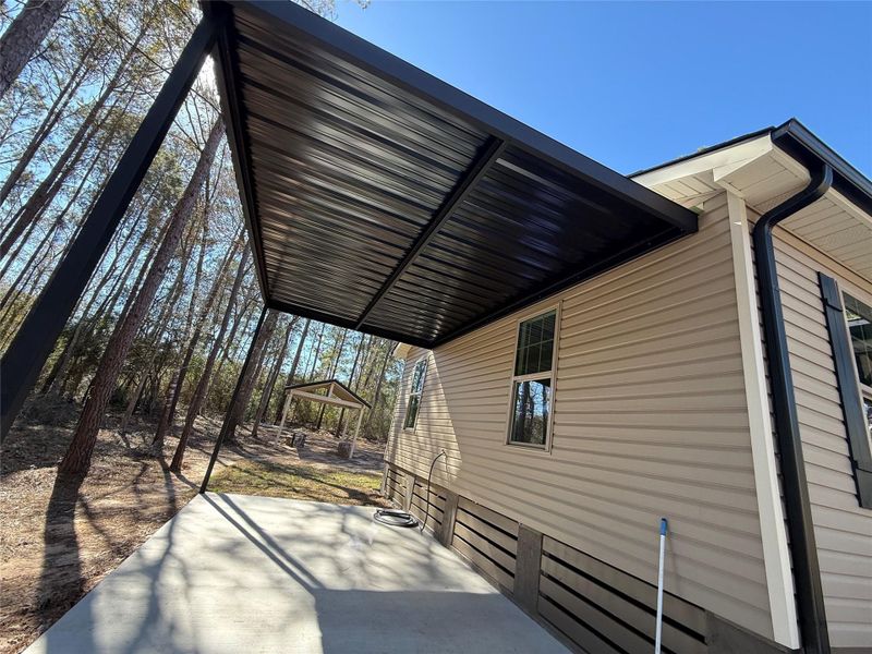 Exterior details and patio area of a home in , Plantersville (Image 17). Exterior details and patio area of a home in , Plantersville (Image 17).