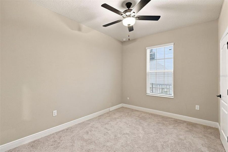 Spacious, unfurnished interior of a new home in Reunion Village, Kissimmee (Image 24).