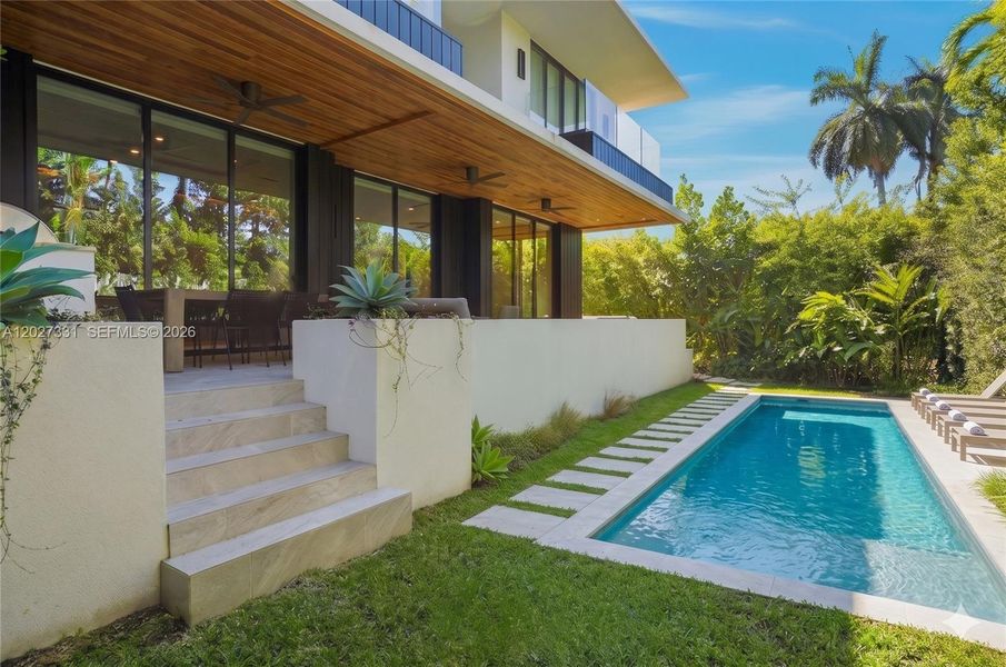 Exterior details and patio area of a home in , Miami Beach (Image 26). Exterior details and patio area of a home in , Miami Beach (Image 26).