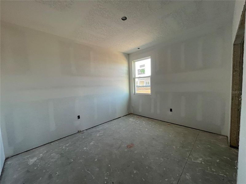 Spacious, unfurnished interior of a new home in Magnolia Series at Seminole Palms, Palm Coast (Image 22).