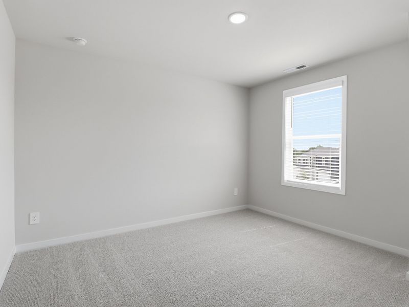 Spacious, unfurnished interior of a new home in Country Lane - Classic Series, Clayton (Image 19).