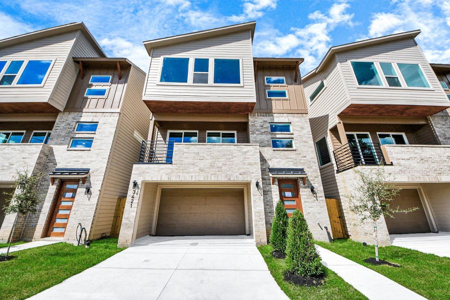 Close-up of contemporary exterior design and front entry. Close-up of contemporary exterior design and front entry.