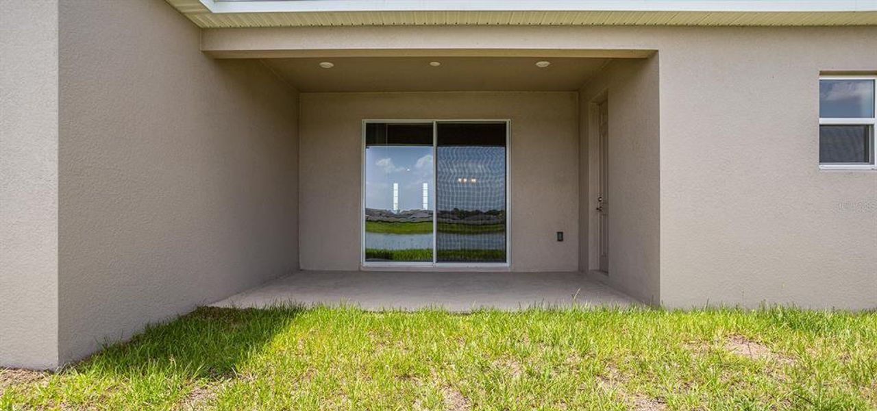 Exterior details and patio area of a home in The Crossings - Single-Family Homes, St. Cloud (Image 2).