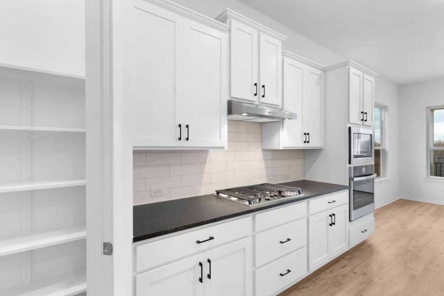 Furnished interior view inside a new home in Carillon, Manor (Image 10).