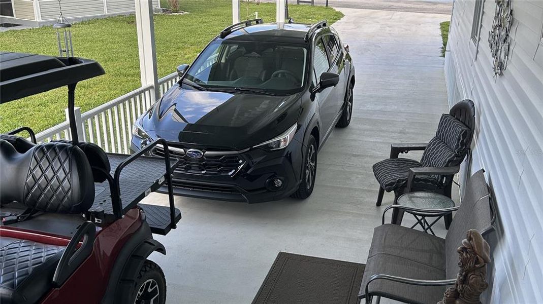 Exterior details and patio area of a home in , Lake Placid (Image 15).