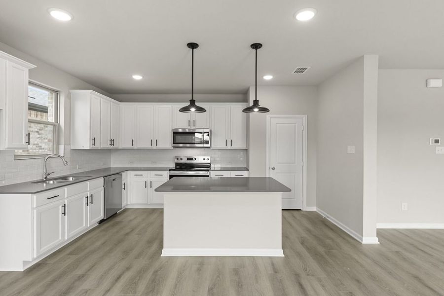 Representative furnished interior of a home built from the Montgomery Colony At Pinehurst by Brohn Homes in Colony at Pinehurst, Pinehurst (Image 4).