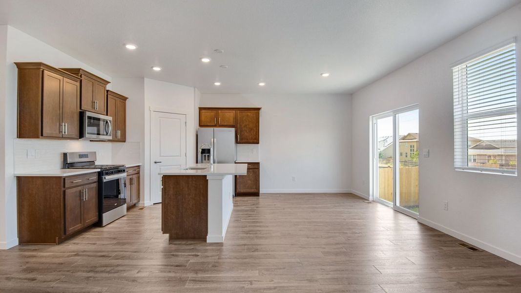 Representative furnished interior of a home built from the Harmony by D.R. Horton in Sky Ranch, Watkins (Image 4).
