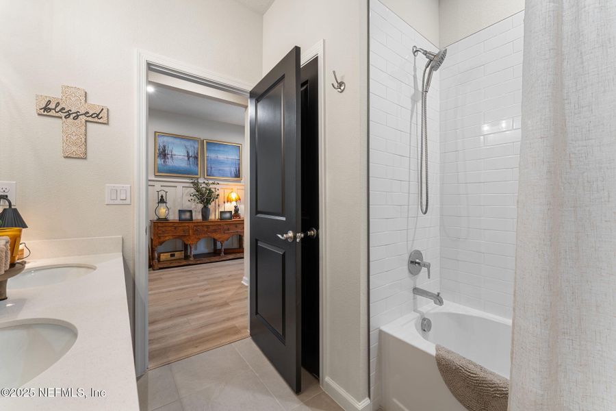Furnished interior view inside a new home in Seminole Palms Single-Family Homes, Palm Coast (Image 60).