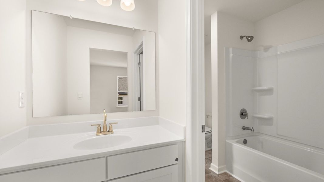 Furnished interior view inside a new home in Wildwood, Covington (Image 17). Furnished interior view inside a new home in Wildwood, Covington (Image 17).