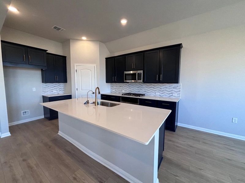 Furnished interior view inside a new home in The Colony, Bastrop (Image 7).