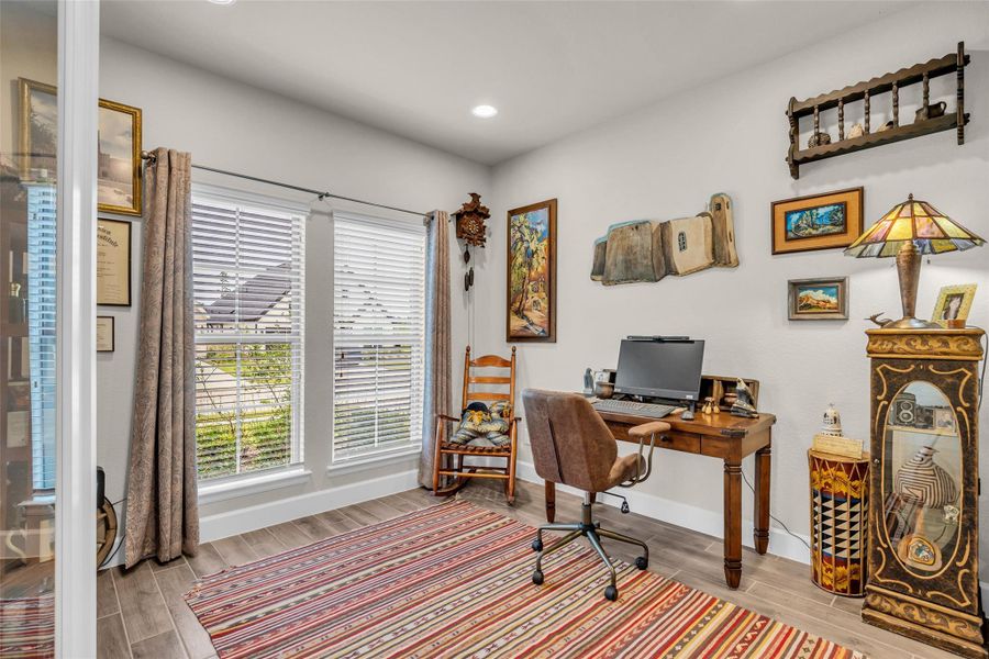 This bright, front bedroom can double as a study or primary suite. This bright, front bedroom can double as a study or primary suite.