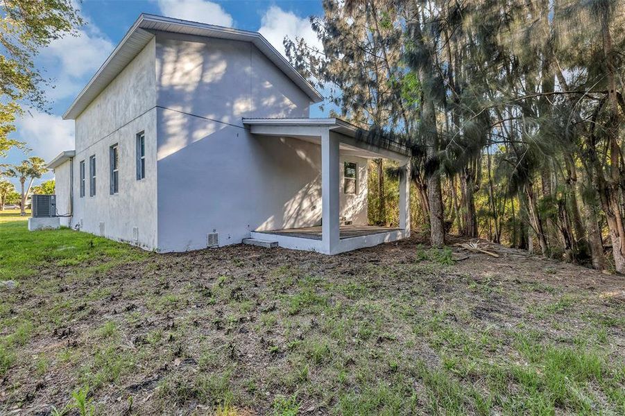 Exterior details and patio area of a home in , New Smyrna Beach (Image 3).