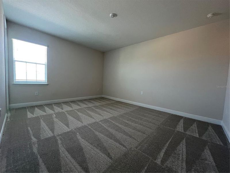 Spacious, unfurnished interior of a new home in Hills of Minneola, Minneola (Image 16).