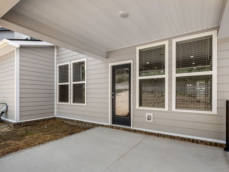 Exterior details and patio area of a home in Woods Crossing, Gallatin (Image 28).