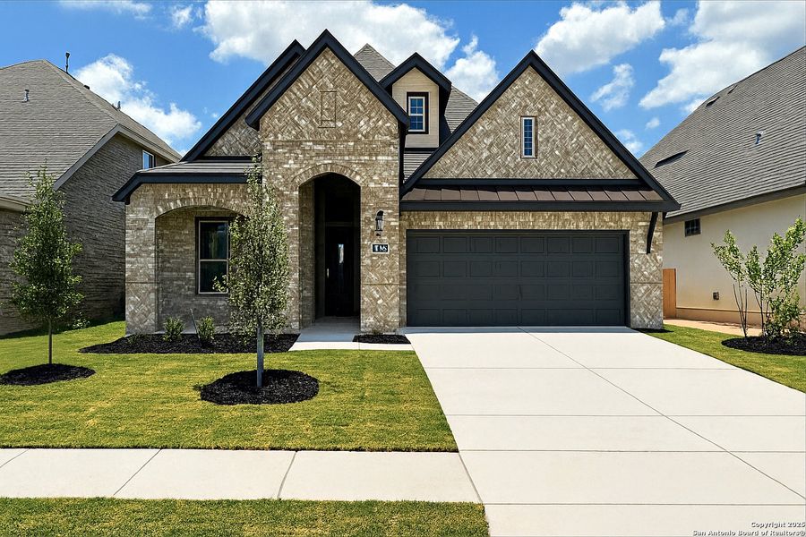 Front exterior of a new home in Ventana, Bulverde, TX, highlighting curb appeal (Image 1). Front exterior of a new home in Ventana, Bulverde, TX, highlighting curb appeal (Image 1).