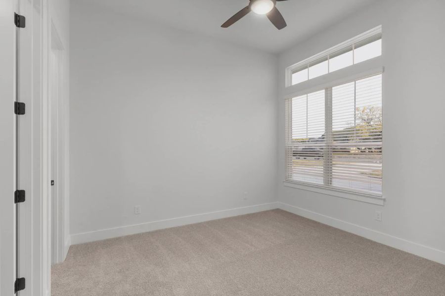 Representative unfurnished interior of a home built from the Merritt by Chesmar Homes in Feathergrass, Fulshear (Image 12).