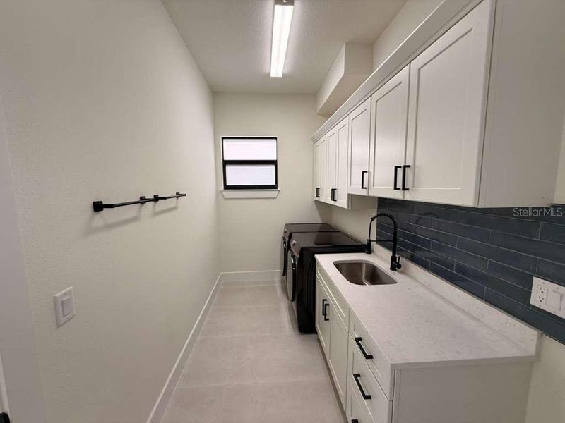 Furnished interior view inside a new home in , Port Charlotte (Image 6). Furnished interior view inside a new home in , Port Charlotte (Image 6).