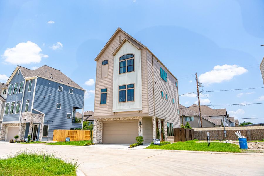 Front exterior of a new home in Spring Valley Creek, Houston, TX, highlighting curb appeal (Image 22).