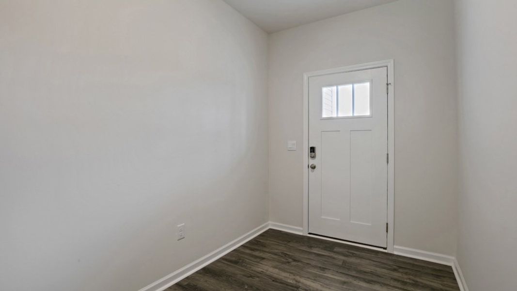 Spacious, unfurnished interior of a new home in The Grove at Matthews Landing, Fuquay Varina (Image 11).