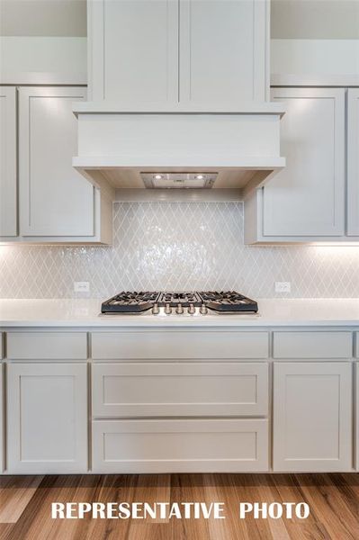 Beautiful finishes and thoughtful design elements are everywhere you look in this wonderfully designed kitchen!  REPRESENTATIVE PHOTO